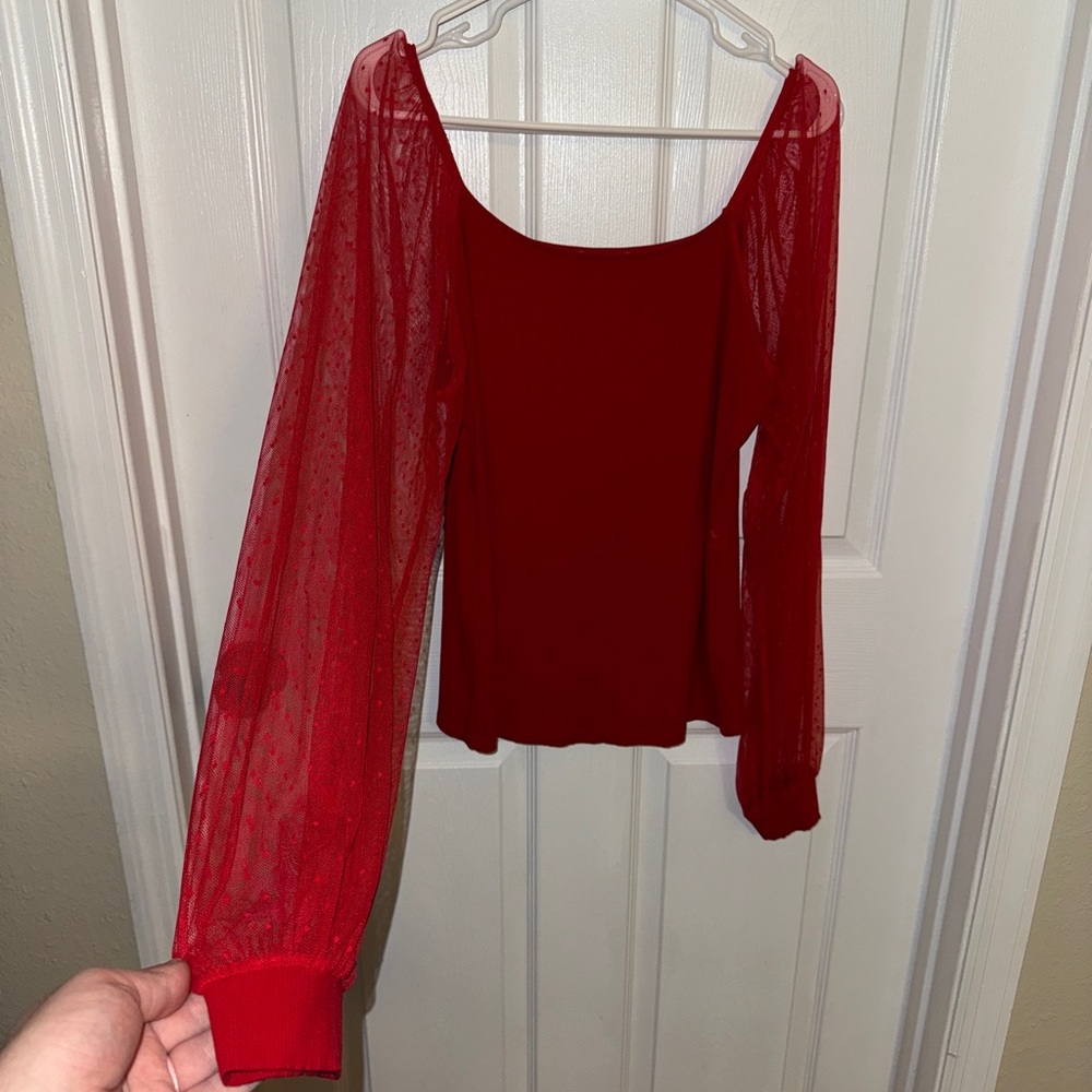 Fitted Red Blouse with Flowing Sleeves